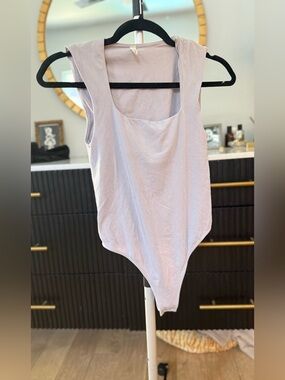 Free People Sleeveless Scoop Bodysuit in Light Lavender